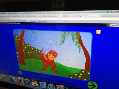 Scooter reads Dinosaur dance